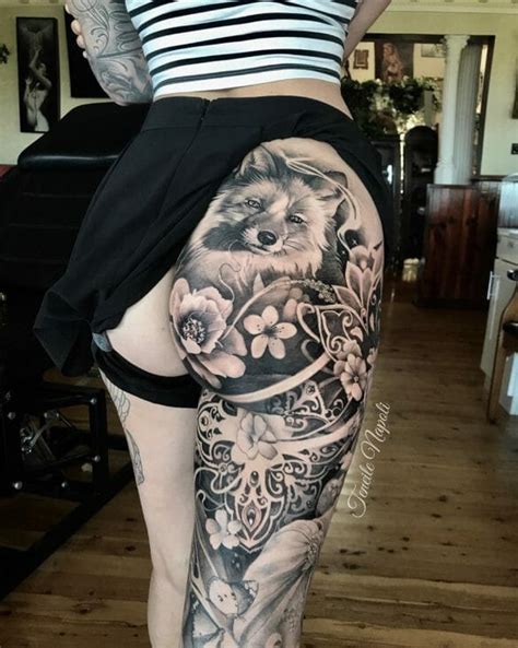 bum and thigh tattoos|tattoo above buttocks.